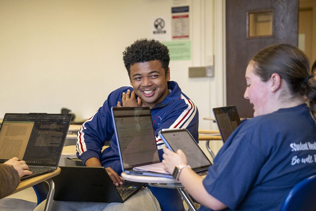 Students in Beach Hall working on a group project.