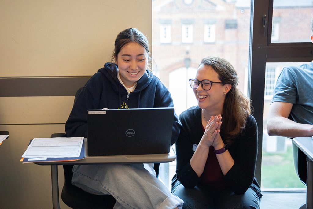 An advisor meeting with a student.