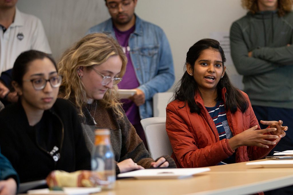 Students sitting in on a lecture.